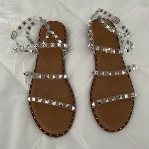 Brand new - never worn. Size 10 strappy studded sandals.
